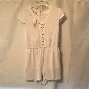 New with tag, cute white romper.